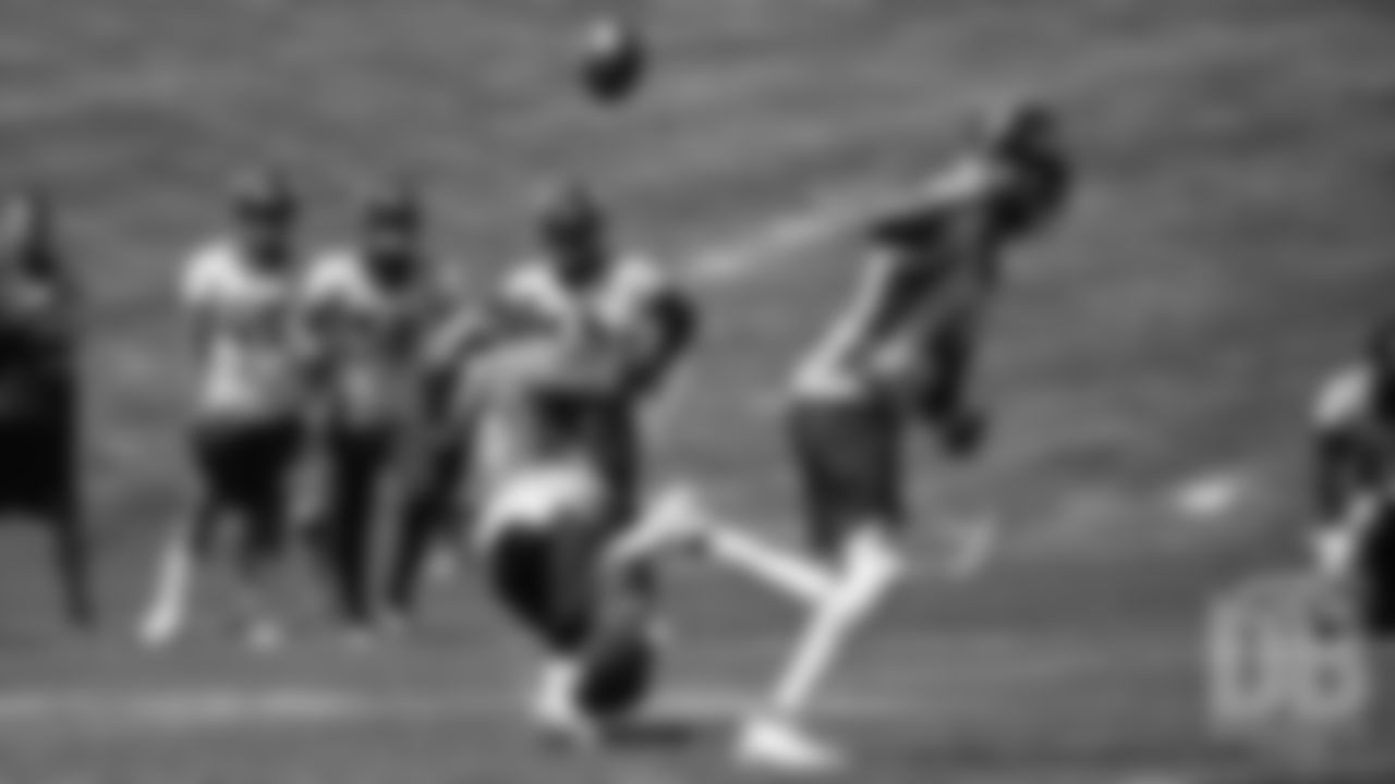 Fred Brown looks to catch a tipped pass during the Broncos' practice on the ninth day of their OTAs on May 31, 2019.