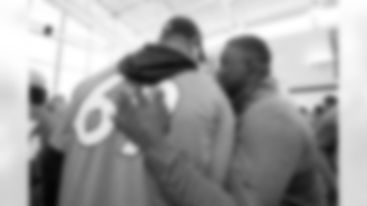 Mike McGlinchey greets Rod Smith during an alumni breakfast and practice at Centura Health Training Center in Englewood, Colorado on September 16, 2023. Photo by Ben Swanson / Denver Broncos