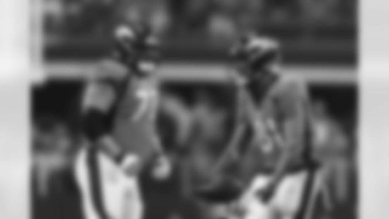 Denver Broncos wide receiver Tim Patrick (81) and offensive lineman Quinn Meinerz (77) react after a reception during the NFL game against the Dallas Cowboys on Sunday, November 7, 2021 at AT&T Stadium in Arlington, Texas.
Photo by Gabriel Christus