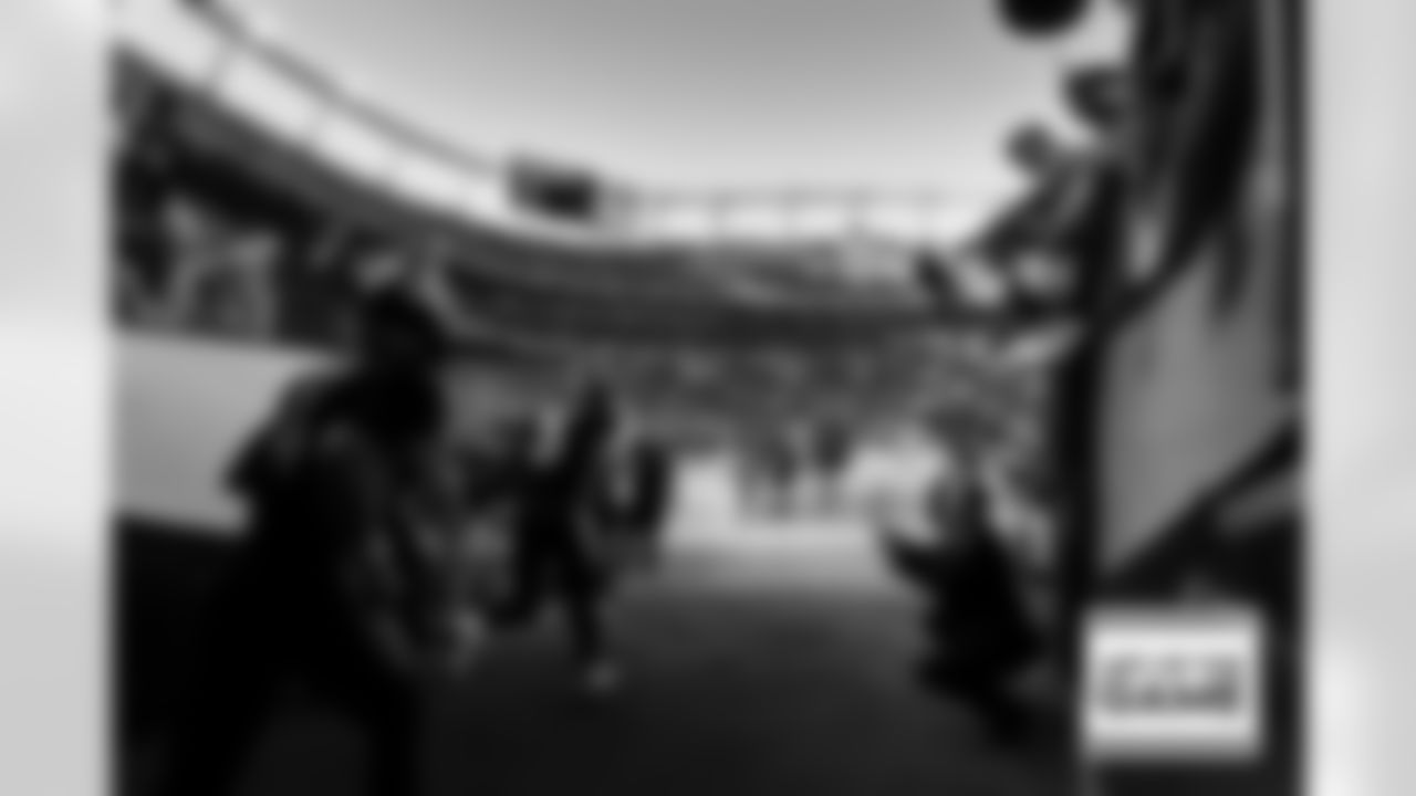 Russell Wilson runs out of the tunnel at the Broncos' Week 3 game against the San Francisco 49ers at Empower Field at Mile High in Denver, Colorado on September 25, 2022. (Photo by Eric Lars Bakke)