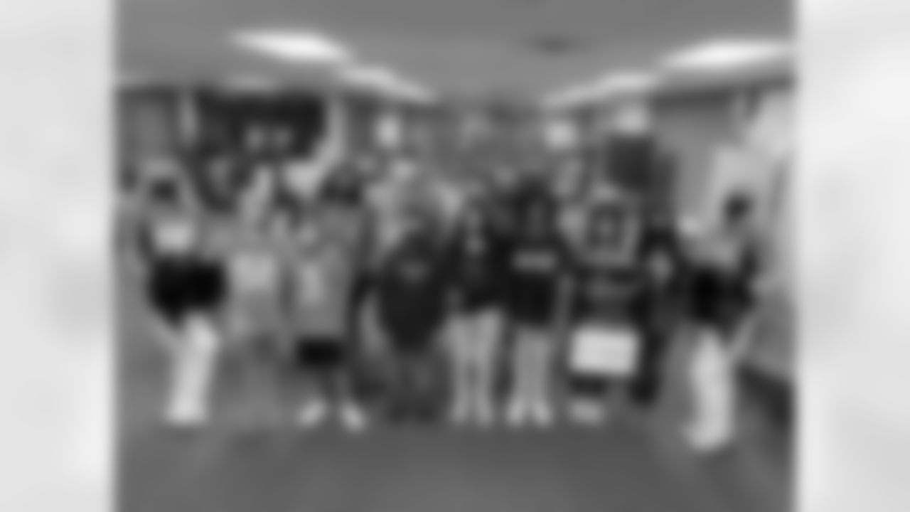 Denver Broncos Cheerleaders and Miles the Mascot delivery more than 1,800 gourmet boxed lunches, prepared by Epicurean Catering, to healthcare professionals, local nonprofits, first responders, teachers, and essential and frontline workers.