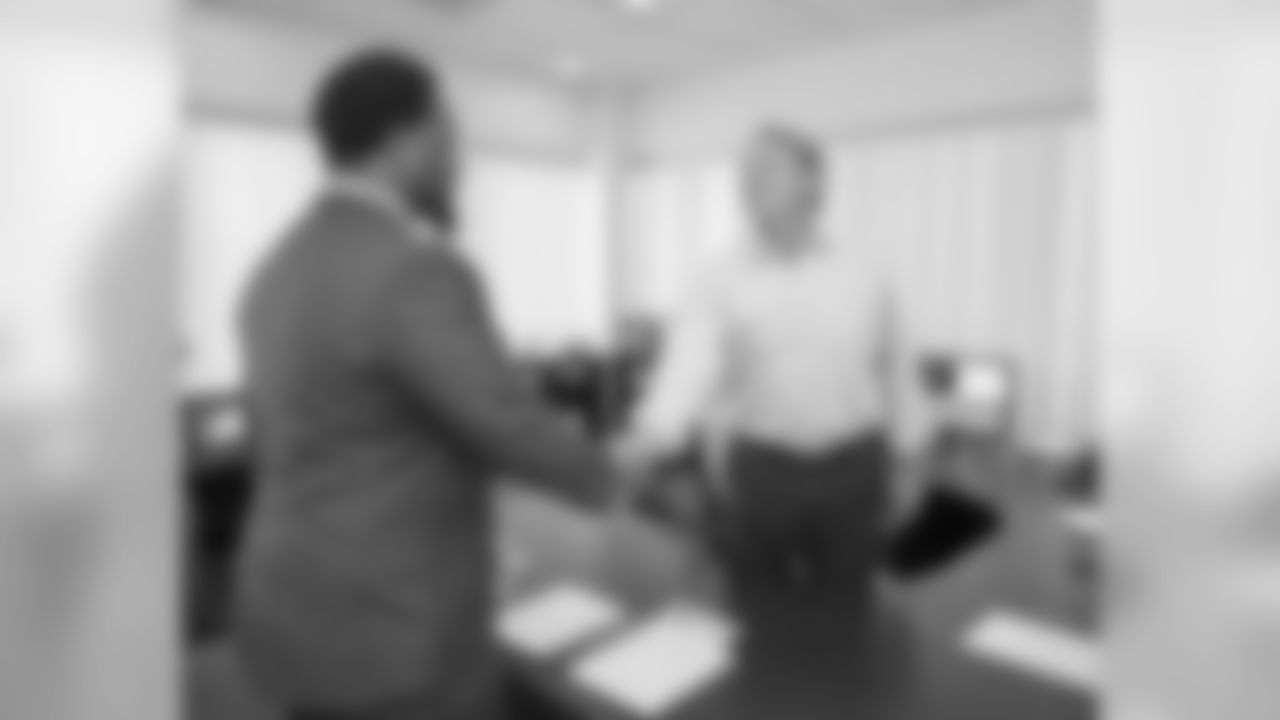 Williams meets Defensive Coordinator Jack Del Rio.