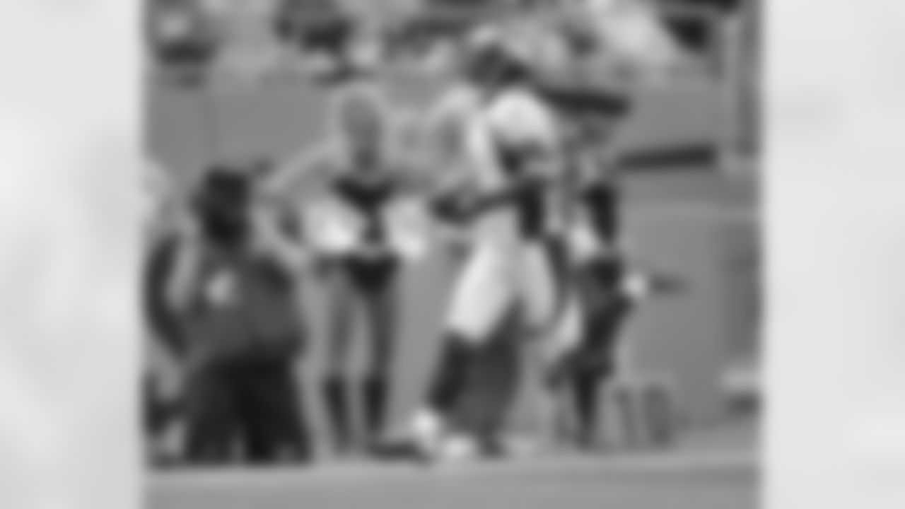 Trindon Holliday returns a punt 76 yards for a touchdown at Carolina.