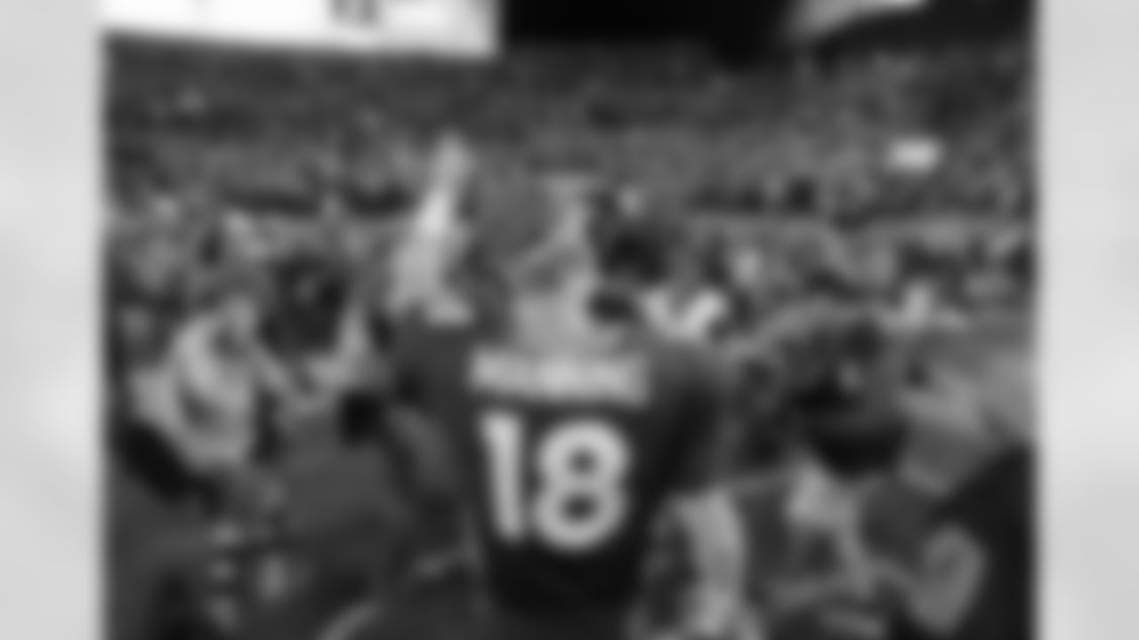 Denver Broncos quarterback Peyton Manning (18) waves to fans after action against the San Francisco 49ers in the NFL game at Sports Authority Field in Denver, CO, October 19, 2014.