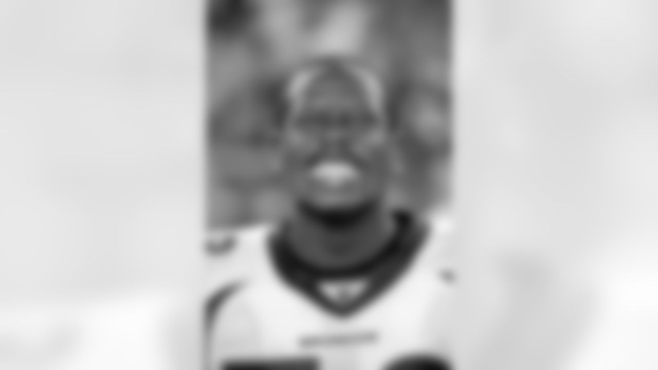 Denver Broncos Von Miller sets his mouth piece prior to action against the Arizona Cardinals in the NFL game September 1, 2011 at University of Phoenix Stadium in Phoenix, AZ.