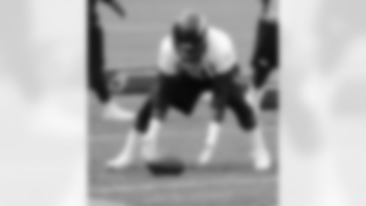 LB Von Miller goes through a fumble-recovering drill.