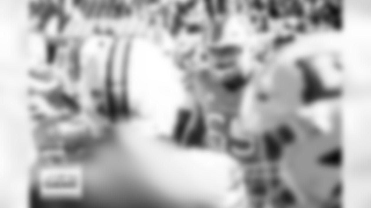 Denver Broncos offensive tackle Mike McGlinchey (69) speaks in a huddle before the Broncos' Week 5 game against the New York Jets at Empower Field at Mile High in Denver, Colorado on October 8, 2023. Photo by Ben Swanson / Denver Broncos