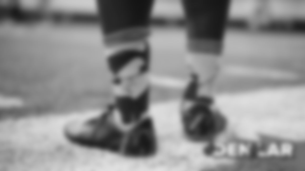 Shamarko Thomas' Tasmanian devil socks at practice on August 22, 2019 at UCHealth Training Center. (Photo by Ben Swanson