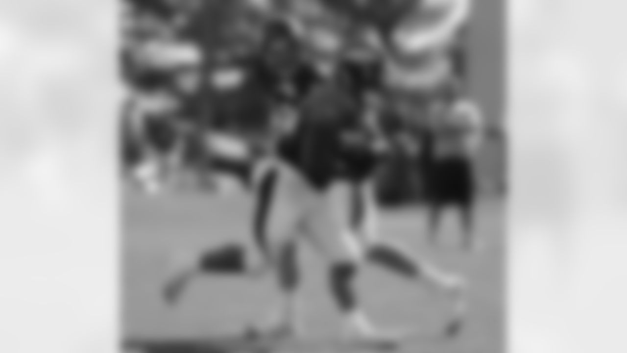 Manning hands to Ball.