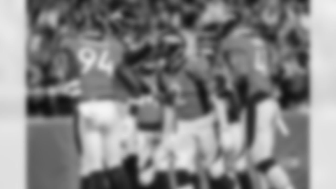 Pat Surtain II, Justin Simmons, Aaron Patrick, Kenny Young and others during the Broncos' Week 12 game against the Los Angeles Chargers at Empower Field at Mile High in Denver, Colorado on November 28, 2021. (Photo by Eric Lars Bakke)