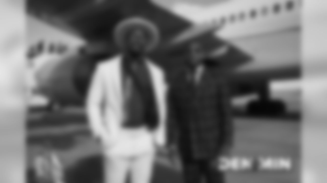 Von Miller and Kareem Jackson on the tarmac at Denver International Airport during the team's travel to Minnesota on November 16, 2019 to face the Vikings.. (Photo by Gabriel Christus)