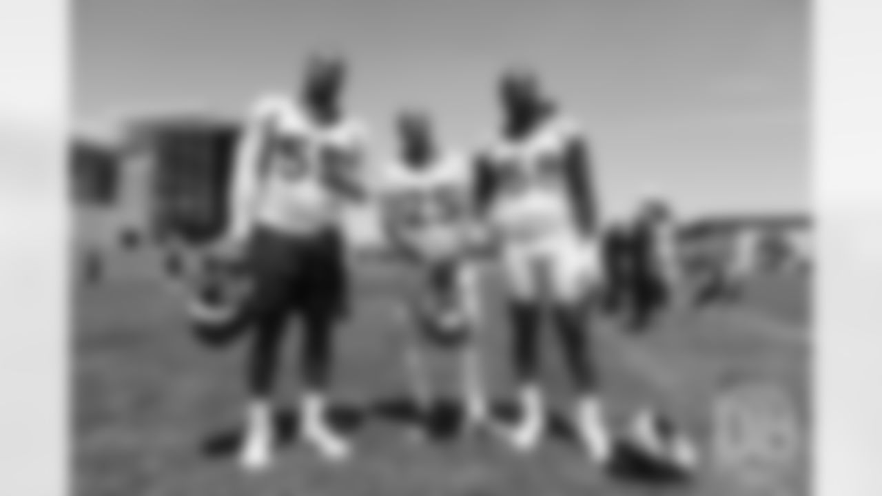 Bradley Chubb, Chris Harris Jr. and Von Miller during the Broncos' practice on the eight day of their OTAs on May 30, 2019.
