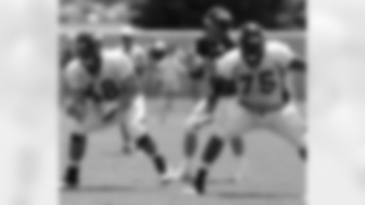 Manning gets the snap as Beadles and Clark get set to protect him.
