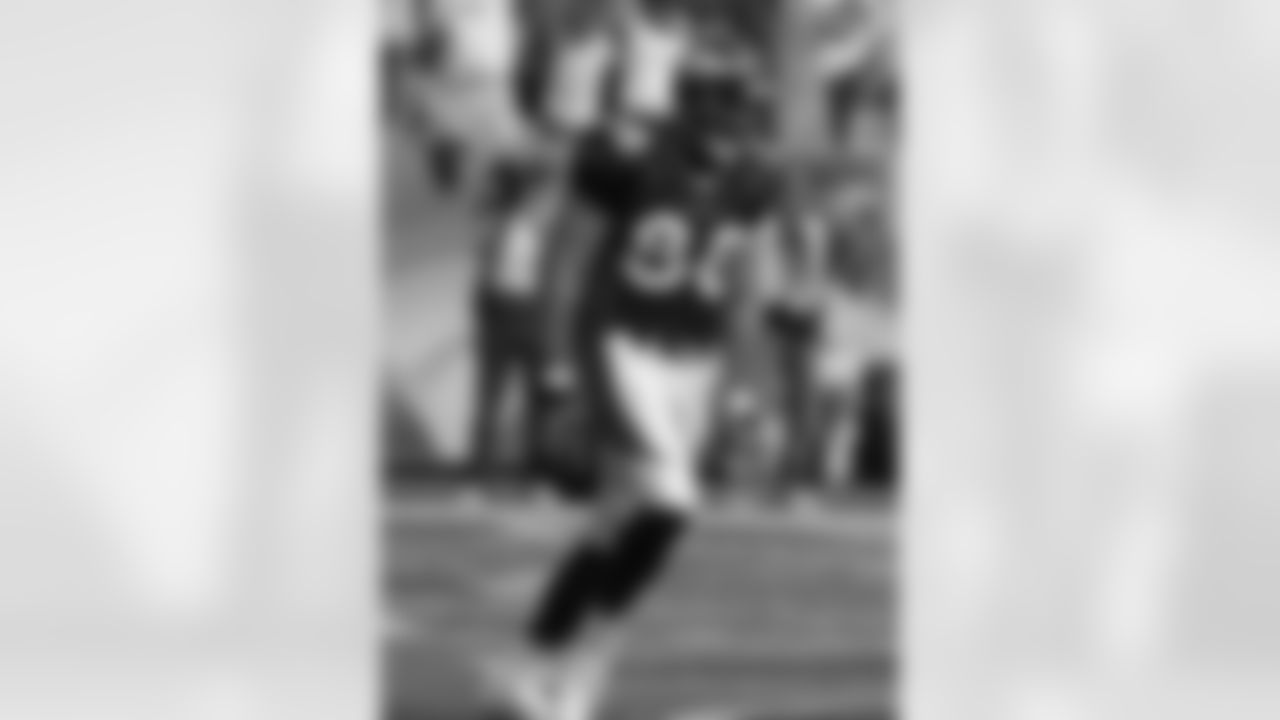 Tony Scheffler celebrates a touchdown reception against the Chargers.