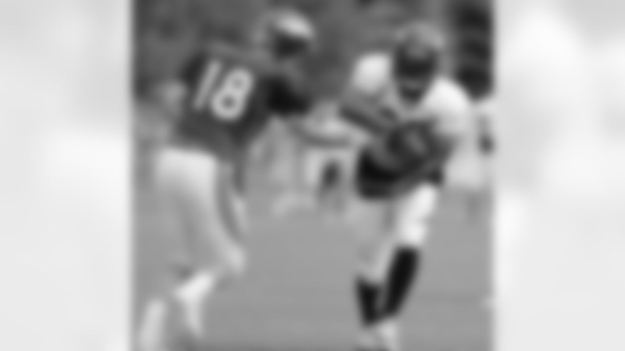 Moreno gets a handoff from Manning.
