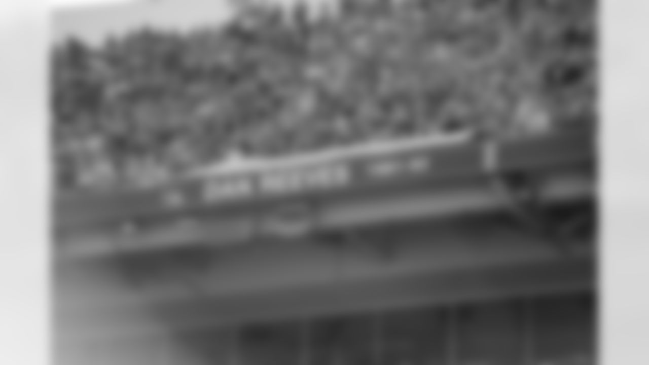 Dan Reeves's name is unveiled in the stadium during his Denver Broncos Ring of Fame induction at halftime of a game against the Chiefs on September 14, 2014.