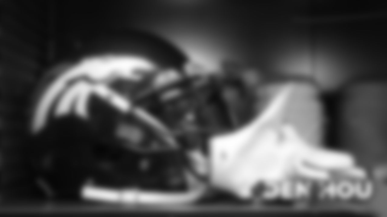 Chris Harris Jr.'s helmet and gloves in the locker room before the Broncos' Week 14 game against the Houston Texans at NRG Stadium on December 8, 2019. (Photo by Ben Swanson)