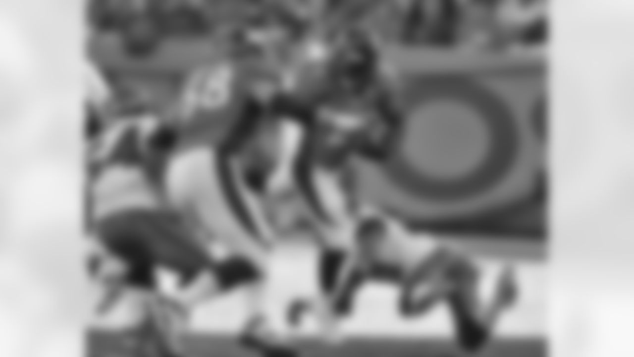 RB Knowshon Moreno looks for running room against Tampa Bay.