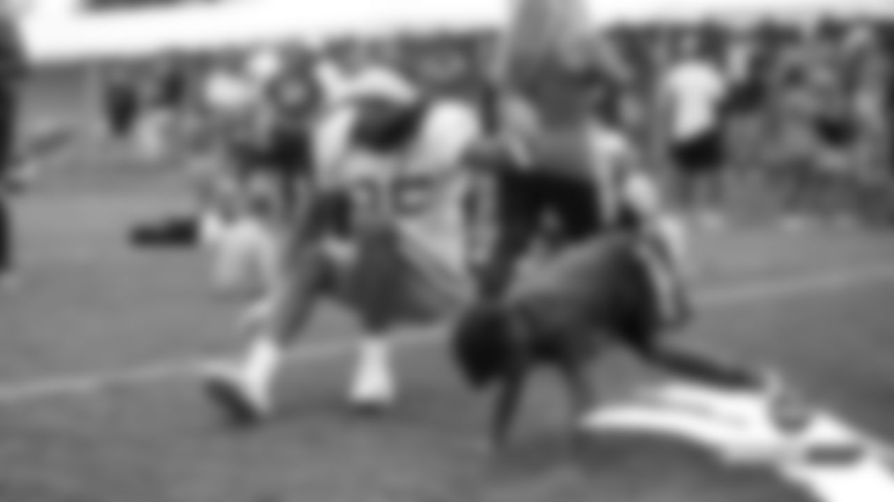 San Francisco 49ers cornerback Richard Sherman (25) falls down as Emmanuel Sanders' son, Princeton, runs a route at a joint practice with the San Francisco 49ers on the 20th day of training camp on August 17, 2019.
