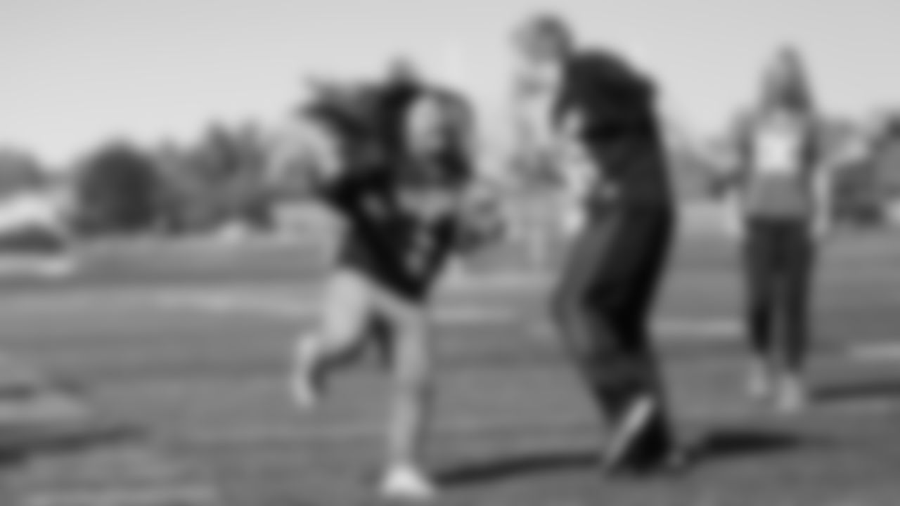 Rangeview students play a game of touch football at Rangeview High School in Aurora, Colorado, after the school received the 2019 Doug Fulton Unified Champion School Kindness Award fromSpecial Olympics Colorado, in partnership with the Broncos and United Airlines. (Photo by Ben Swanson)