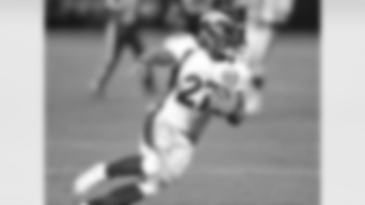 Moreno runs through the Oakland defense.
