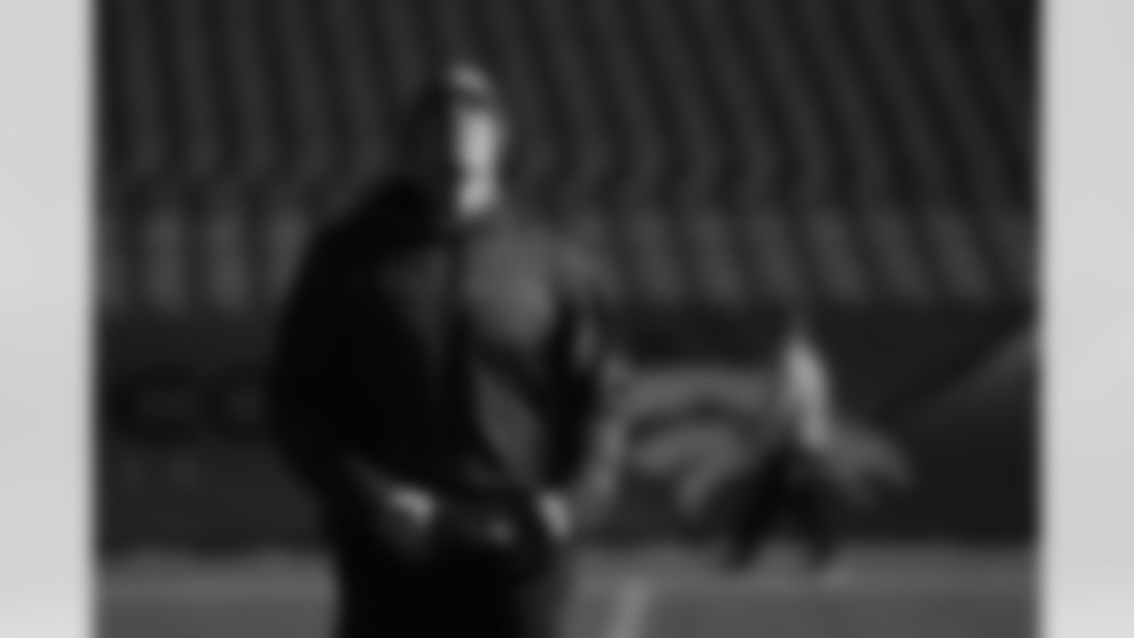 Dreessen gets prepared prior to kickoff Sunday against Kansas City.
