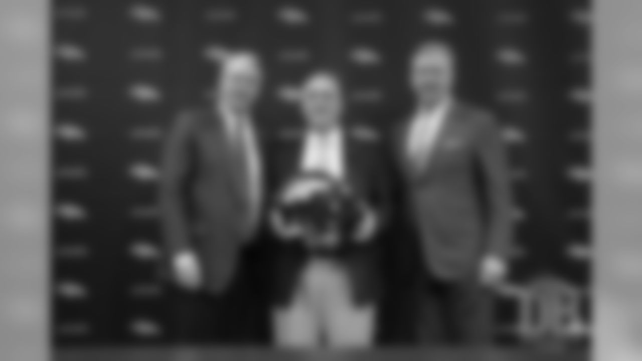 President and CEO Joe Ellis, Head Coach Vic Fangio and President of Football Operations/General Manager John Elway pose for a photo after Fangio's introductory press conference.
Photo by Gabriel Christus