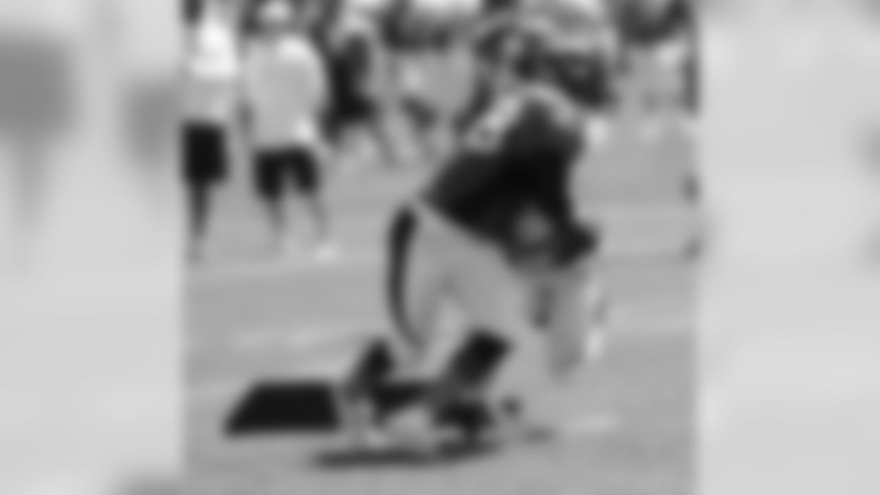 LB Von Miller gets past Lance Ball on his way to the quarterback on a pass-rush drill.