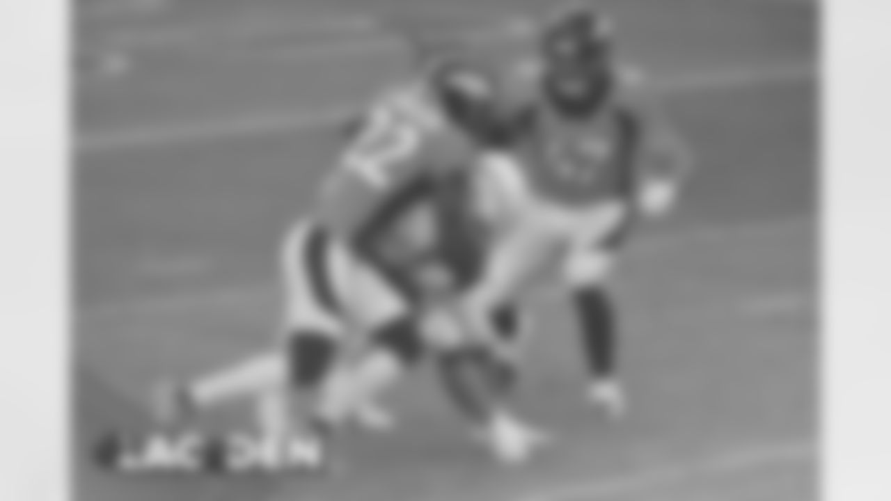 Kareem Jackson makes a tackle during the first half of the Broncos' Week 8 game against the Los Angeles Chargers at Empower Field at Mile High on November 1, 2020. (Photo by Eric Lars Bakke)