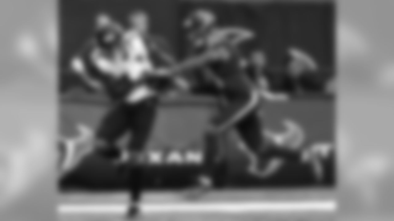 FILE - In this Dec. 18, 2016, file photo, Houston Texans cornerback A.J. Bouye (21) breaks up a pass intended for Jacksonville Jaguars wide receiver Allen Robinson (15) during the first half of an NFL football game in Houston. According to a person familiar with the deals, the Jaguars agreed to terms on Thursday, March 9, 2017, with Houston cornerback A.J. Bouye, Arizona defensive end Calais Campbell and Dallas safety Barry Church on deals totaling more than $150 million. The person spoke to The Associated Press on the condition of anonymity because the Jaguars won't announce any deals until players formally sign Friday. (AP Photo/Eric Christian Smith, File)