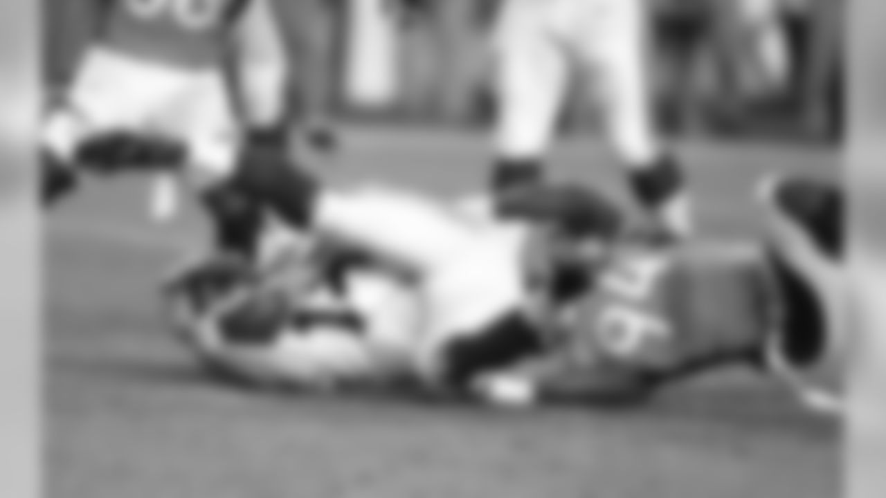 DE DeMarcus Ware and Colts QB Andrew Luck