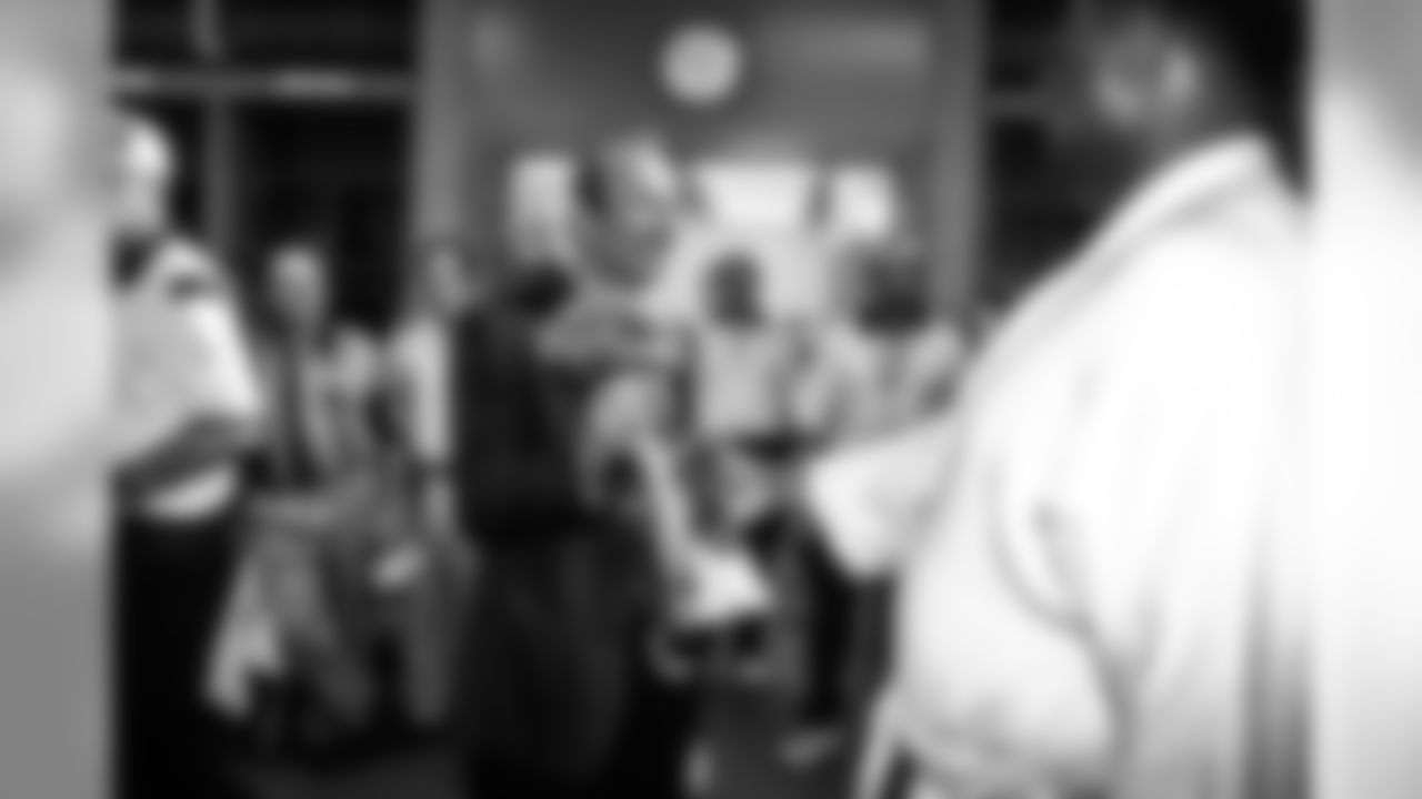 Pat Bowlen enters the locker room with his second consecutive Super Bowl trophy against the Atlanta Falcons at Pro Player Stadium in Miami, FL on January 31, 1999.