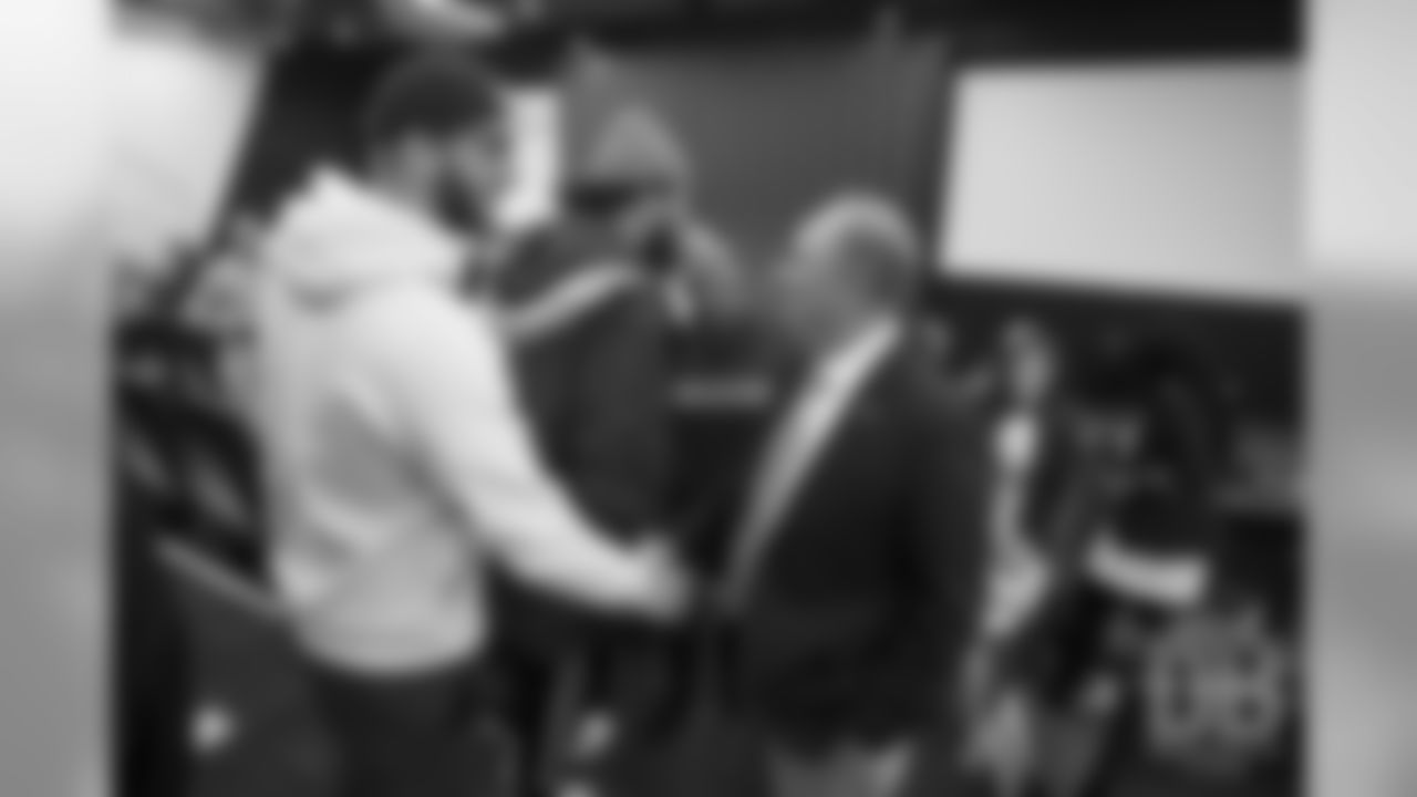 Jake Butt greets Head Coach Vic Fangio after his introductory press conference on January 10, 2019.
Photo by Gabriel Christus