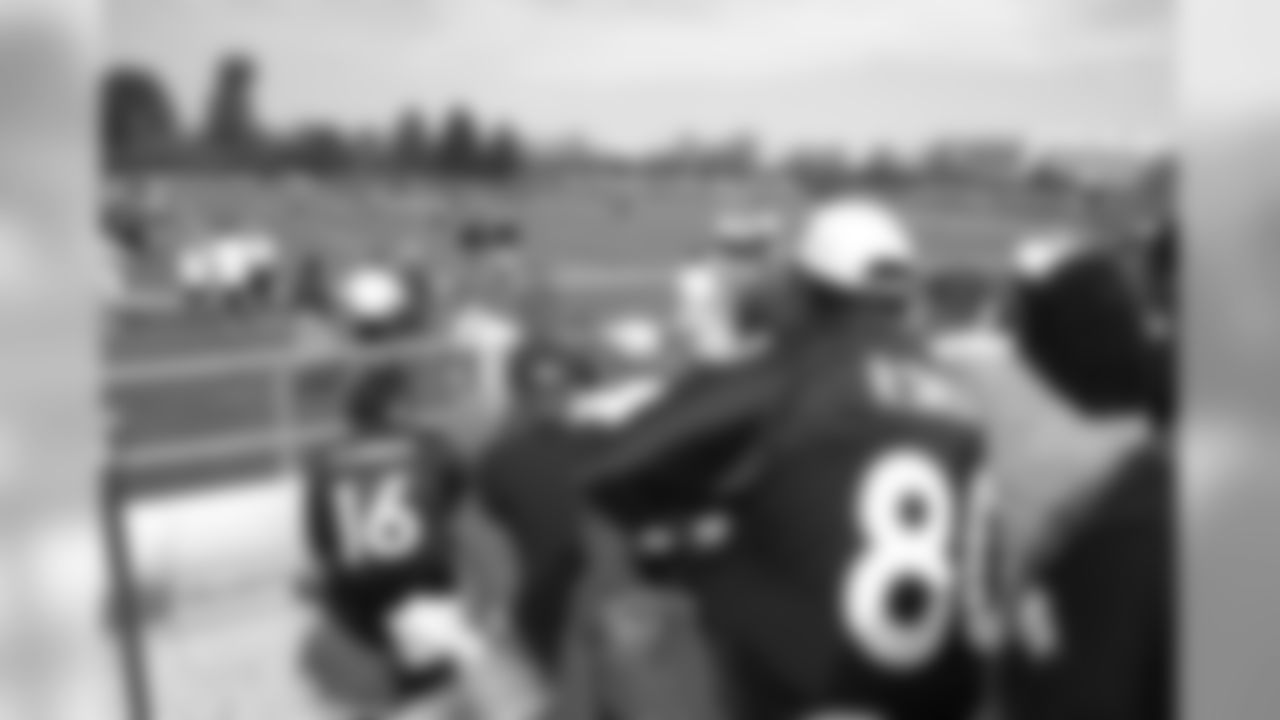 Fans watching a 2003 training camp practice. It was the first year in Broncos history that training camp was held at the Dove Valley facility in Englewood, Colorado.