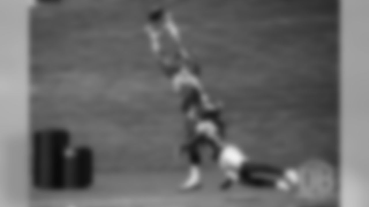 tight end Jake Butt (80) leaps to make a catch during practice at the eighth day of OTAs on June 5, 2018.