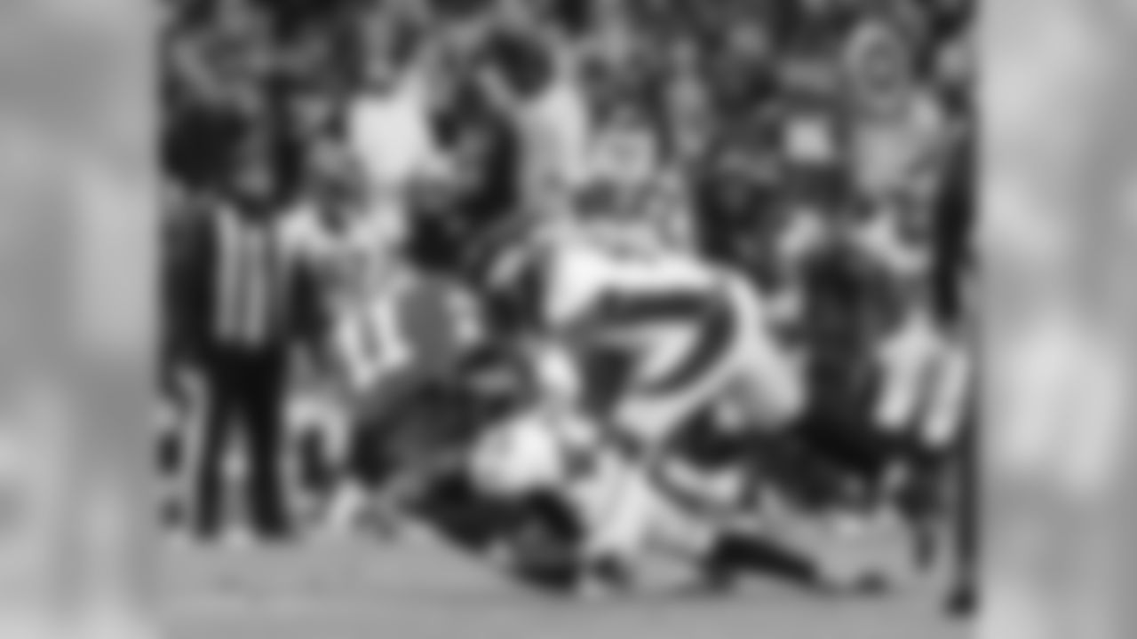 Denver Broncos safety T.J. Ward (43) sacks Kansas City Chiefs quarterback Alex Smith (11) for a 13 yard loss during first quarter action in the NFL game at Arrowhead Stadium in Kansas City, MO, November 30, 2014.