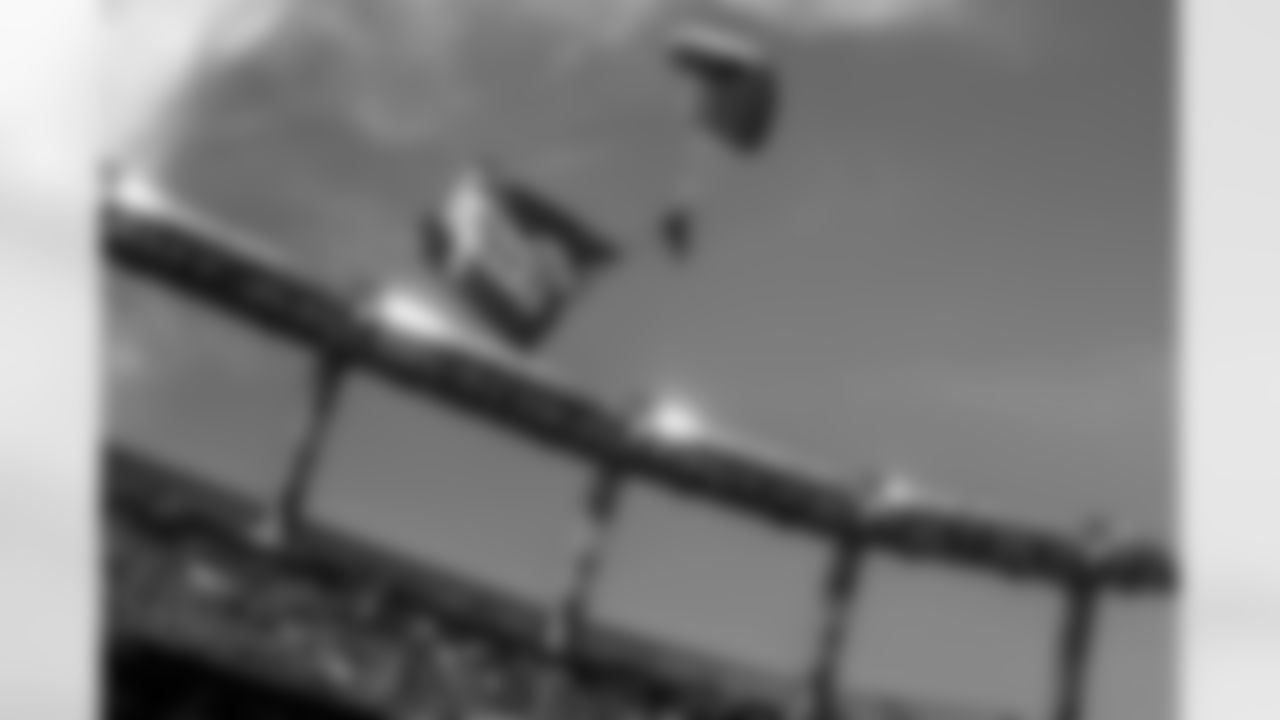 A skydiver parachutes into the stadium during the NFL game against the New York Jets on Sunday, September 26, 2021 at Empower Field at Mile High in Denver, Colorado.
Photo by Gabriel Christus