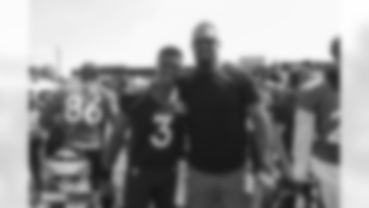 Derek Wolfe with Russell Wilson during training camp on Friday, July 29, 2022 at UCHealth Training Center in Englewood, Englewood.
Photo by Gabriel Christus/Denver Broncos