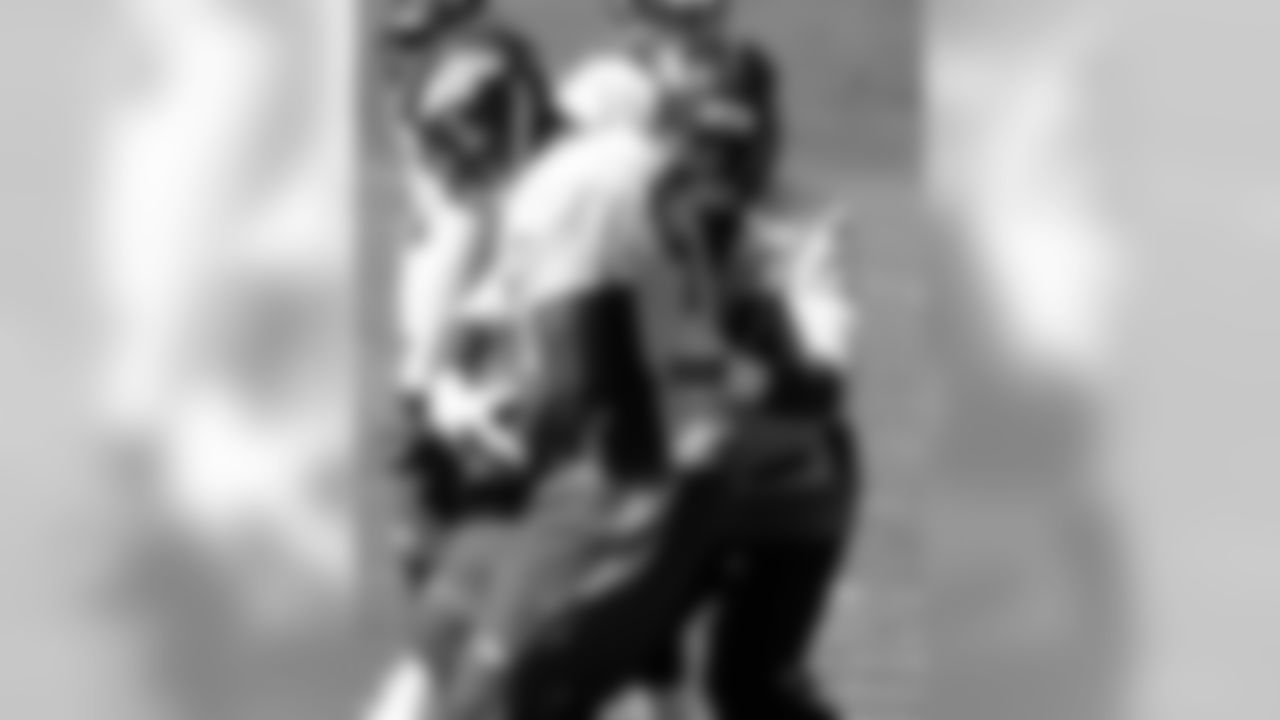 Malik Jackson and DeMarcus Ware