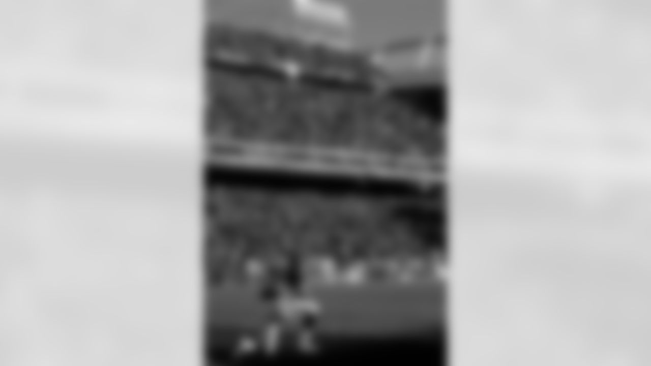 Rod Smith reflects in the end zone about his days at Mile High Stadium before the start of the game against the San Francisco 49ers at Mile High Stadium in Denver, CO on December 23, 2000.