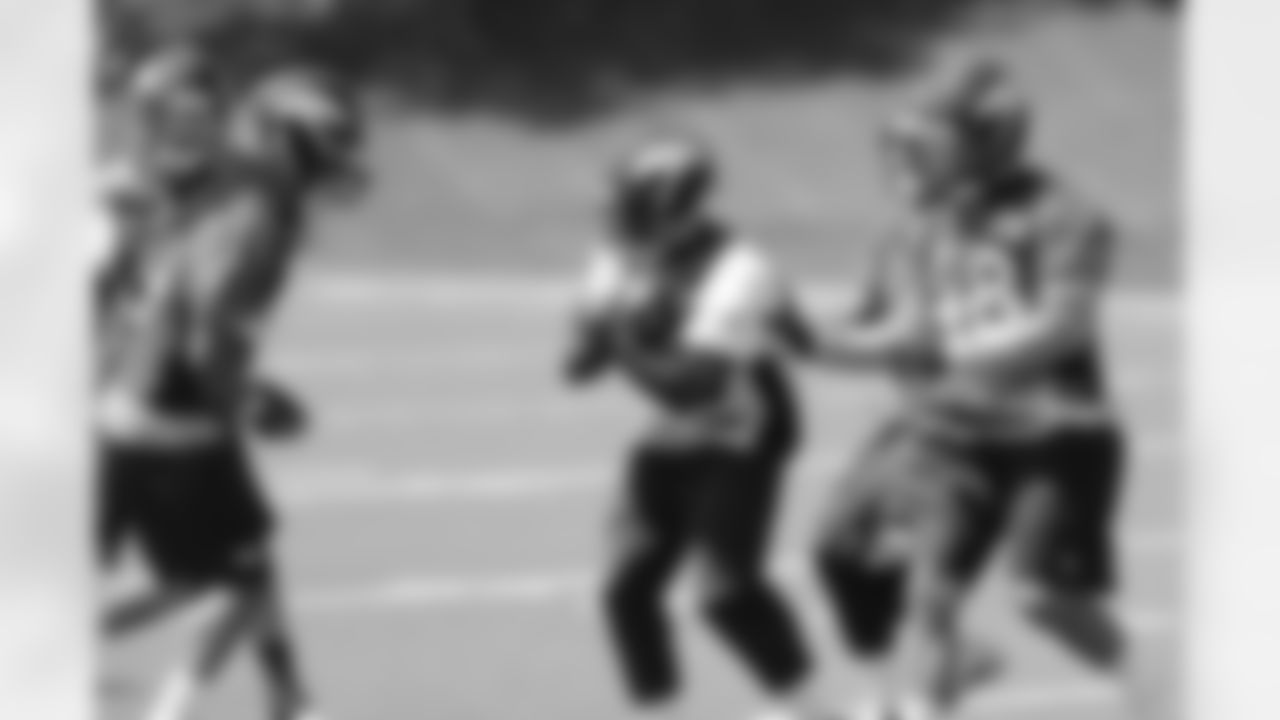 McDuffie comes down with a tipped pass.