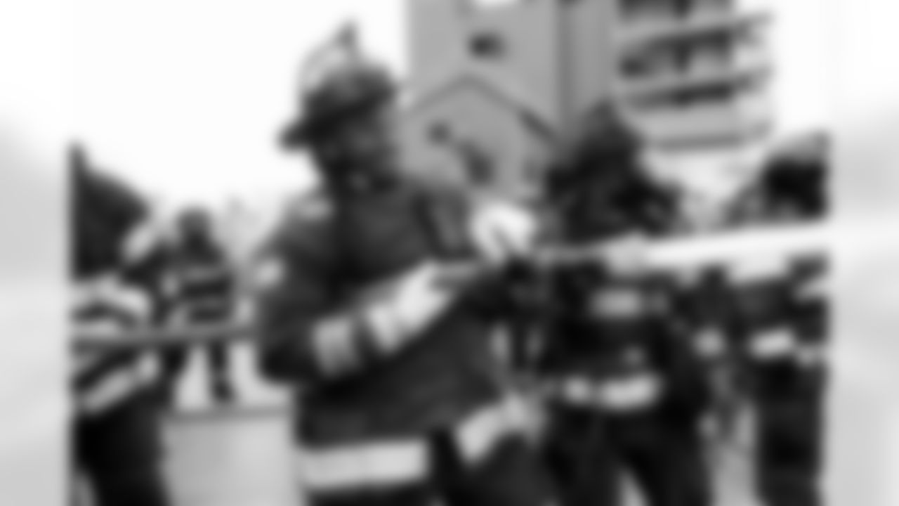 Malik Reed visits the Denver Fire Academy on November 2, 2021 in recognition of First Responders Appreciation Day.