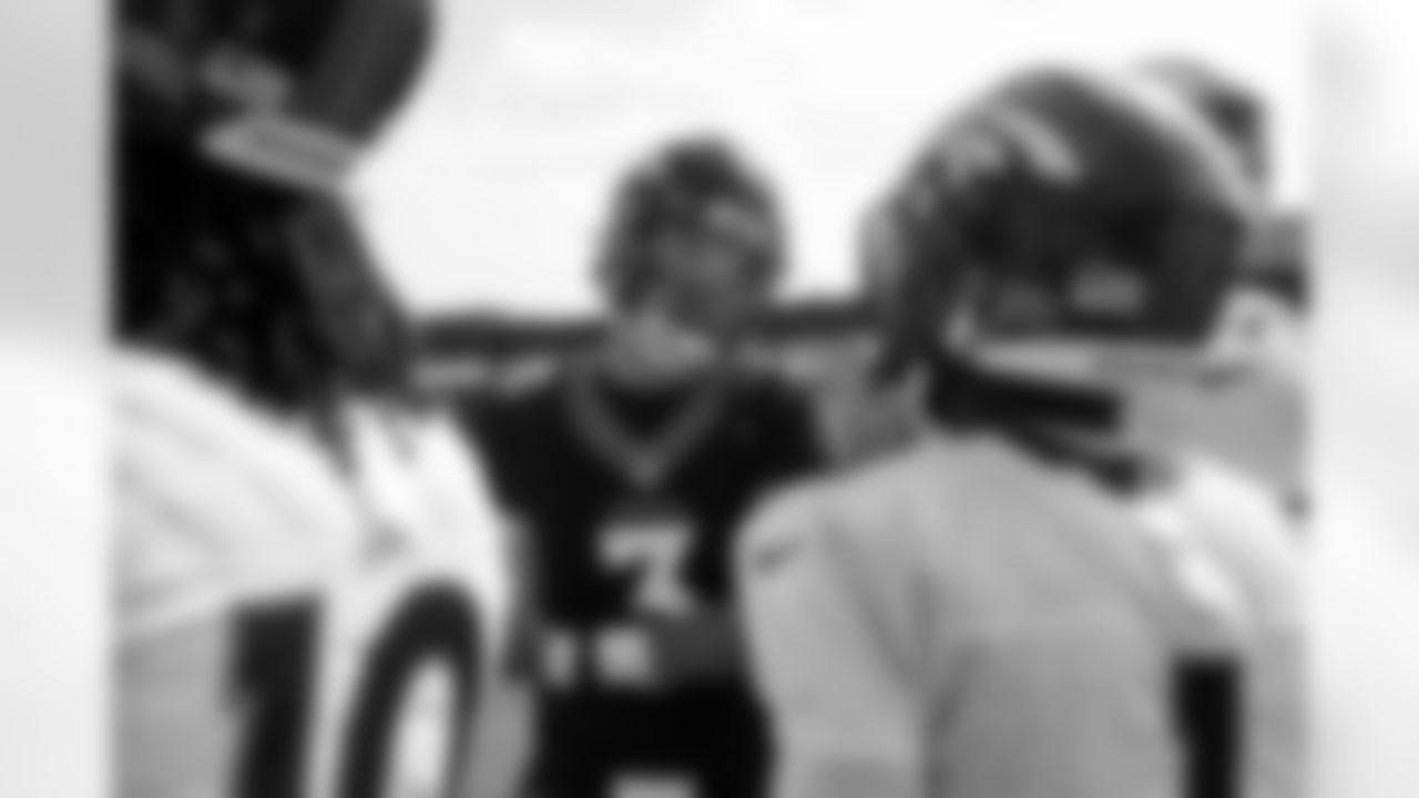 Drew Lock talks with KJ Hamler during practice on Day 17 of training camp at UCHealth Training Center on August 19, 2021. (Photo by Ben Swanson)