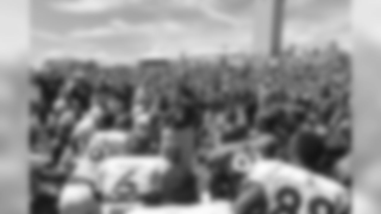 Former Denver Broncos and NFL Network analyst Terrell Davis addresses the Denver Broncos players after practice at Denver Broncos training camp August 8, 2015 at the UCHealth Training Center in Englewood,CO.