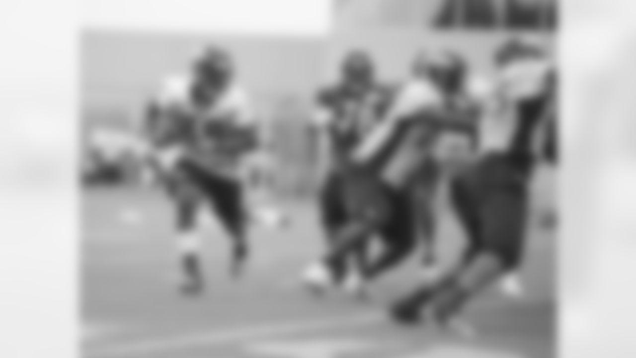 Ball looks for room to run.