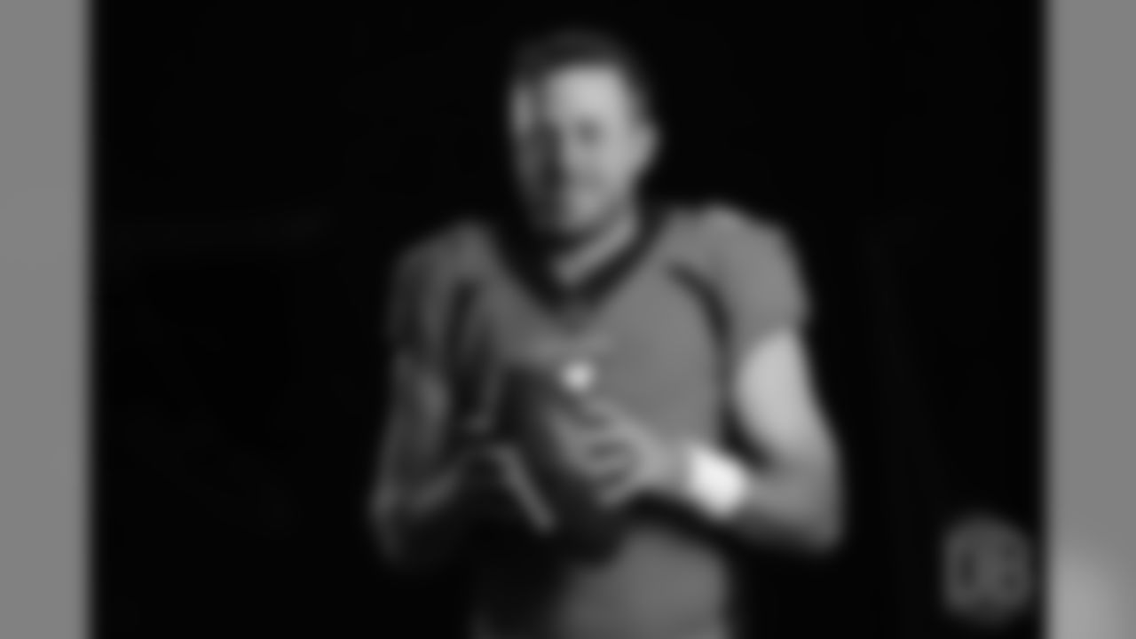 Quarterback Case Keenum (4) poses for photos during the media sessions with network photographers and videographers on June 12, 2018.