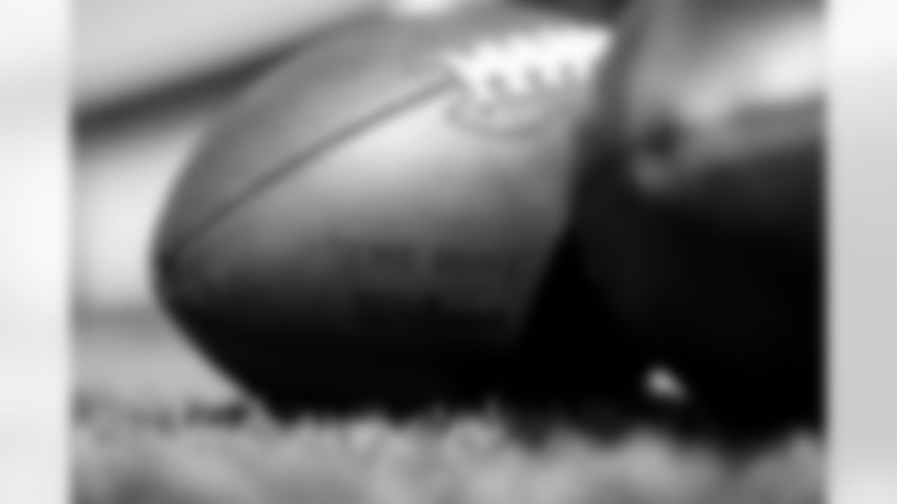 A football on the ground during practice at UCHealth Training Center on September 6, 2021. (Photo by Ben Swanson)