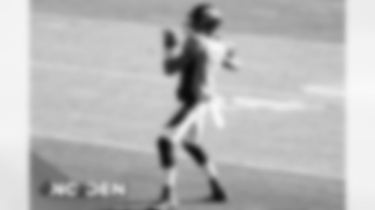 Kendall Hinton warms up before the Broncos' Week 12 game against the New Orleans Saints at Empower Field at Mile High on November 29, 2020. (Photo by Gabriel Christus)