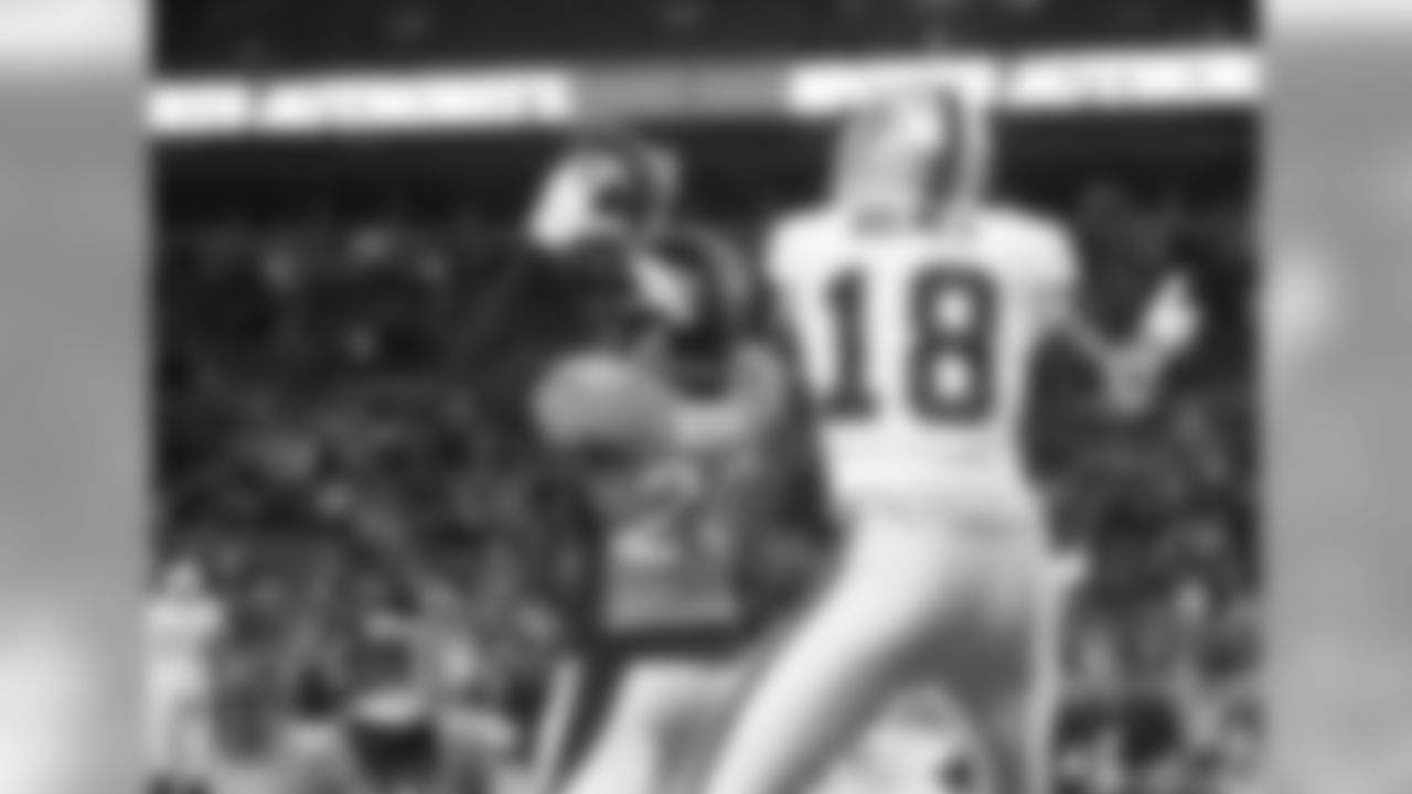 S Josh Bush intercepts a pass against the Oakland Raiders. Bush joined the Broncos as a free agent in 2014.