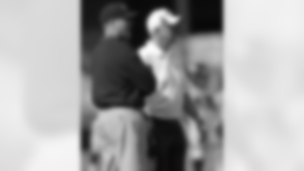 Broncos Head Coach John Fox and 49ers Head Coach Jim Harbaugh